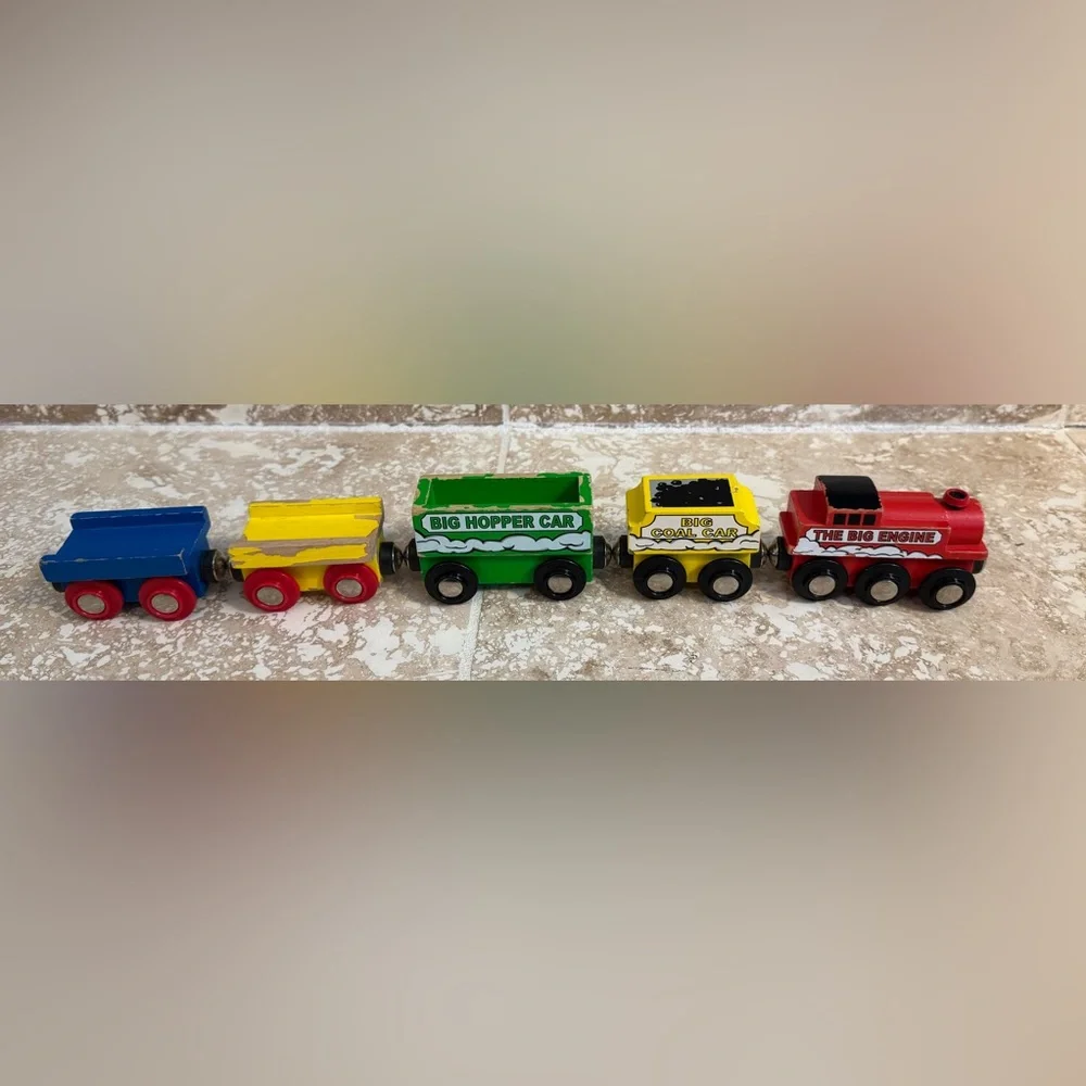 5 wooden train cars (including engine) compatible with Brio and Thomas.
